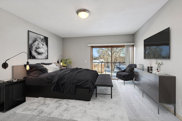 3000 Raleigh Ave Unit 306, Saint Louis Park, MN 55416 - bedroom with access to outside and light carpet