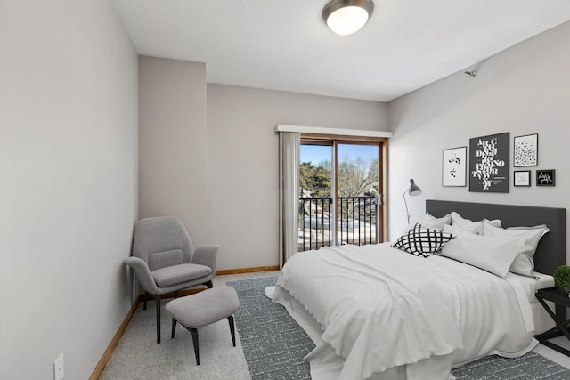 3000 Raleigh Ave Unit 306, Saint Louis Park, MN 55416 - carpeted bedroom featuring baseboards and access to exterior