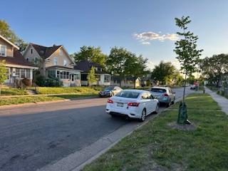 905 Fuller Ave, Saint Paul, MN 55104 - view of asphalt street featuring sidewalks, curbs, and a residential view