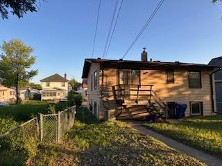 905 Fuller Ave, Saint Paul, MN 55104 - back of house with a chimney