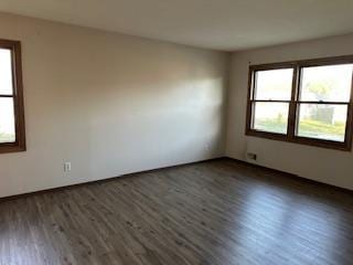 905 Fuller Ave, Saint Paul, MN 55104 - empty room featuring healthy amount of natural light and wood finished floors