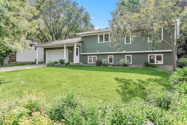 8563 72nd St S, Cottage Grove, MN 55016 - split level home with an attached garage, a front yard, and driveway