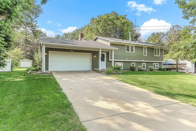8563 72nd St S, Cottage Grove, MN 55016 - split level home with a chimney, concrete driveway, a front yard, and a garage