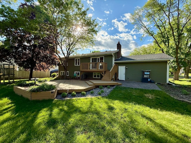 8563 72nd St S, Cottage Grove, MN 55016 - rear view of property featuring a wooden deck, a chimney, and a patio