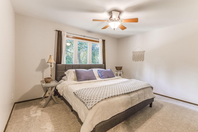 8563 72nd St S, Cottage Grove, MN 55016 - bedroom featuring light colored carpet, baseboards, and a ceiling fan