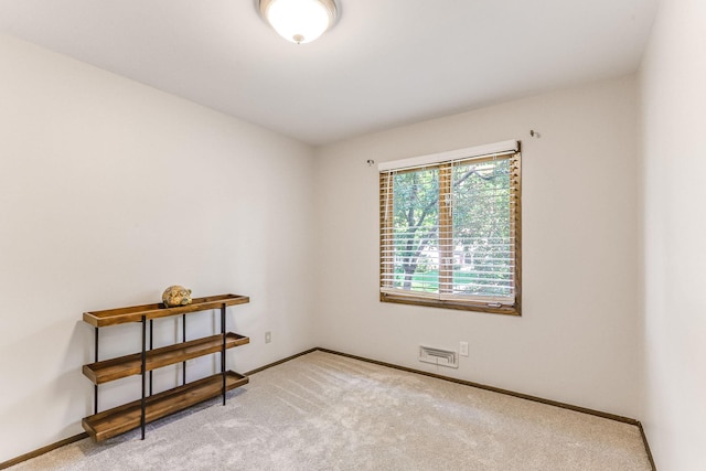 8563 72nd St S, Cottage Grove, MN 55016 - spare room featuring light carpet and baseboards