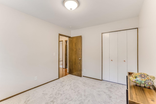 8563 72nd St S, Cottage Grove, MN 55016 - bedroom featuring carpet floors, a closet, and baseboards