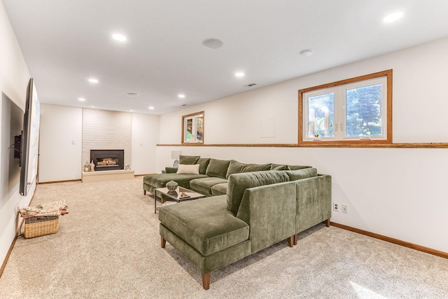 8563 72nd St S, Cottage Grove, MN 55016 - living area with light colored carpet, baseboards, recessed lighting, and a fireplace