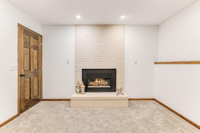 8563 72nd St S, Cottage Grove, MN 55016 - detailed view of carpet flooring, a fireplace, recessed lighting, and baseboards