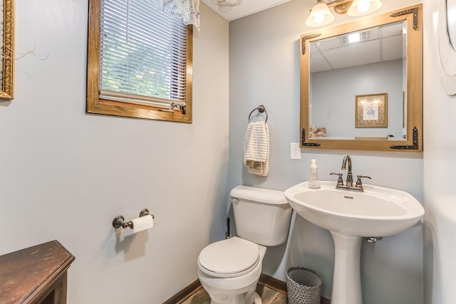 8563 72nd St S, Cottage Grove, MN 55016 - half bathroom with toilet and baseboards