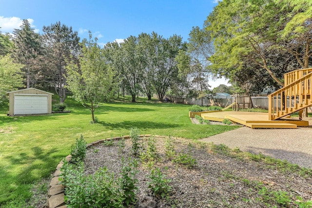 8563 72nd St S, Cottage Grove, MN 55016 - view of yard featuring a deck, an outdoor structure, stairs, and a detached garage