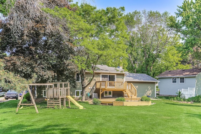 8563 72nd St S, Cottage Grove, MN 55016 - back of house with a wooden deck, a playground, and a lawn
