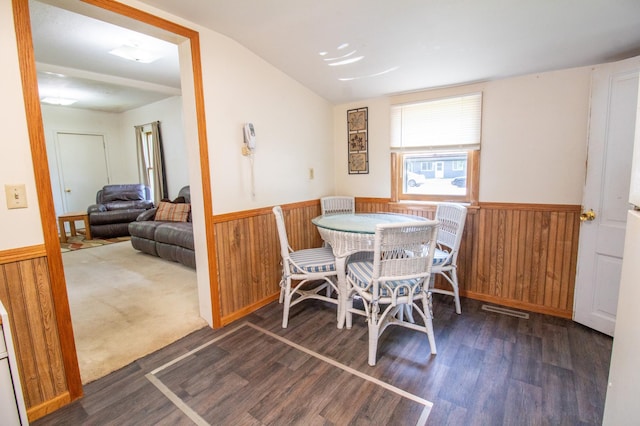 103 3rd St NE, Barnesville, MN 56514 - dining area with a wainscoted wall, wood finished floors, and wooden walls
