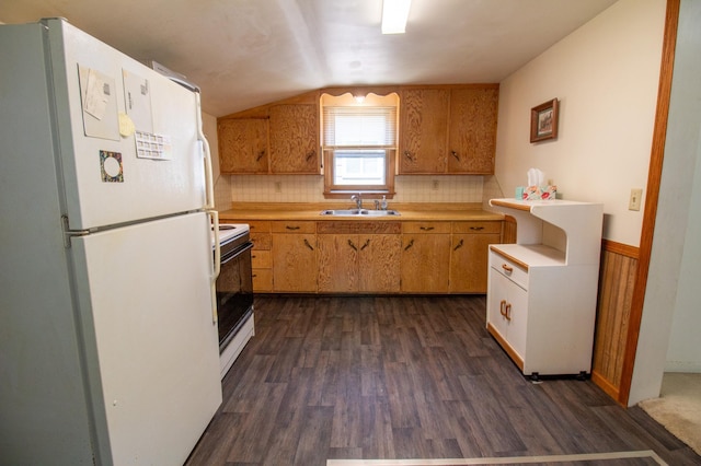 103 3rd St NE, Barnesville, MN 56514 - kitchen with white appliances, a sink, dark wood-style floors, light countertops, and lofted ceiling