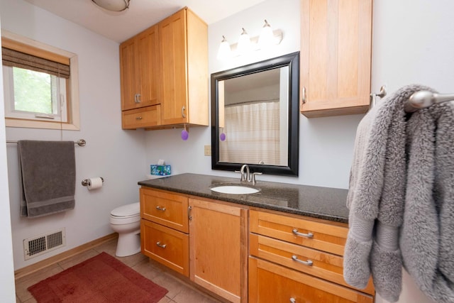 840 Shore Dr W, Orono, MN 55364 - bathroom with vanity, toilet, tile patterned flooring, baseboards, and a shower with shower curtain