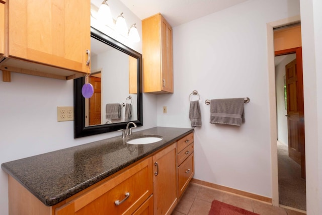 840 Shore Dr W, Orono, MN 55364 - bathroom featuring vanity, tile patterned flooring, and baseboards