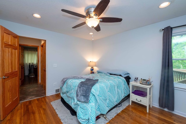 840 Shore Dr W, Orono, MN 55364 - bedroom featuring wood finished floors, baseboards, recessed lighting, and ceiling fan