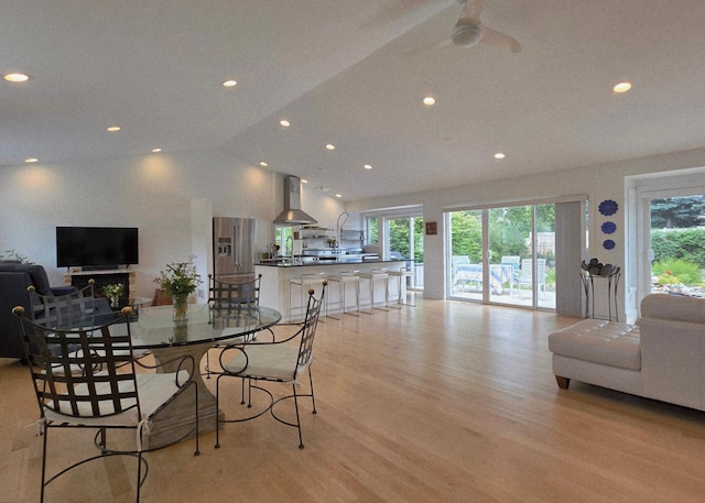 1300 Earle Way, Burnsville, MN 55306 - dining space with plenty of natural light, light wood finished floors, recessed lighting, lofted ceiling, and a ceiling fan