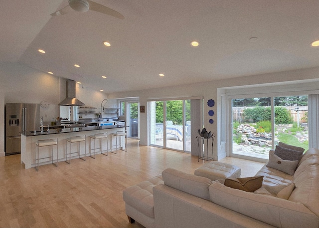 1300 Earle Way, Burnsville, MN 55306 - living room with recessed lighting, light wood-type flooring, and a ceiling fan