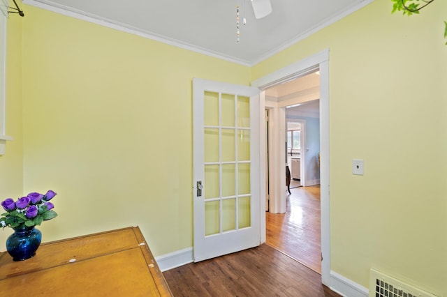 1252 Arkwright St, Saint Paul, MN 55130 - hall featuring dark wood-type flooring and ornamental molding