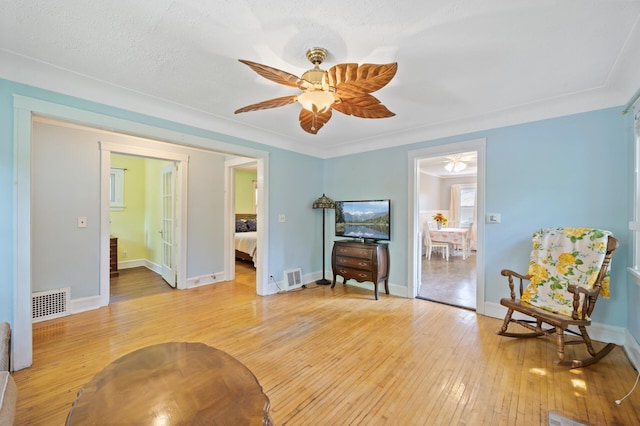 1252 Arkwright St, Saint Paul, MN 55130 - living area featuring ceiling fan and light wood-style floors