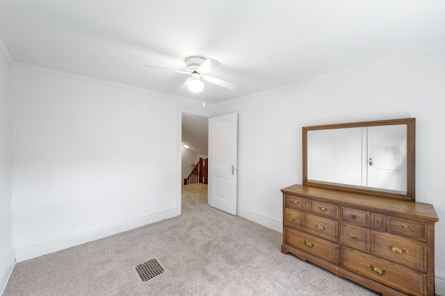 1252 Arkwright St, Saint Paul, MN 55130 - unfurnished bedroom with light colored carpet, ornamental molding, and ceiling fan