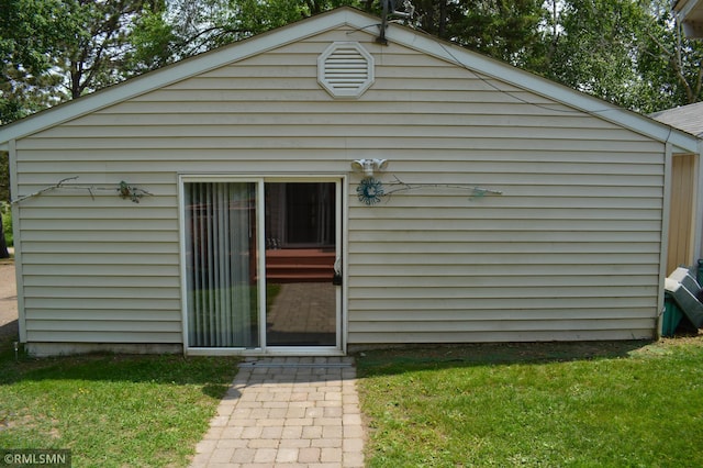 31145 409th Pl, Aitkin, MN 56431 - rear view of property featuring a lawn