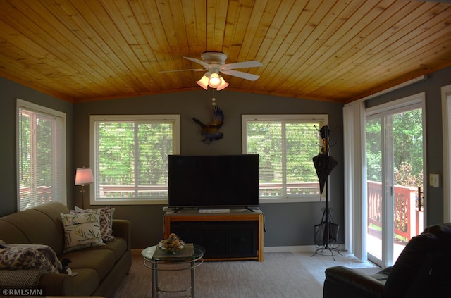 31145 409th Pl, Aitkin, MN 56431 - living area with wood ceiling, vaulted ceiling, ceiling fan, and carpet flooring