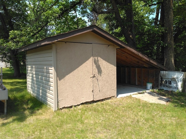 7047 Kingfisher Ln NE, Frohn Twp, MN 56601 - view of shed featuring a carport