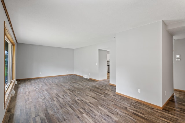 15429 Ramsey Blvd NW, Ramsey, MN 55303 - unfurnished room with wood finished floors and baseboards