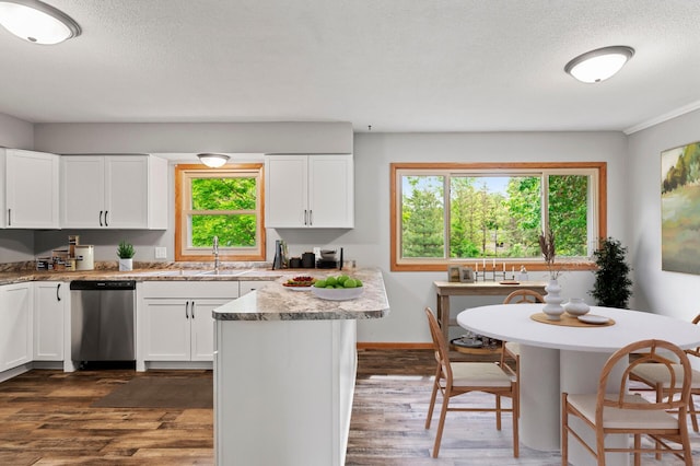 15429 Ramsey Blvd NW, Ramsey, MN 55303 - kitchen with stainless steel dishwasher, a sink, dark wood finished floors, white cabinetry, and a textured ceiling