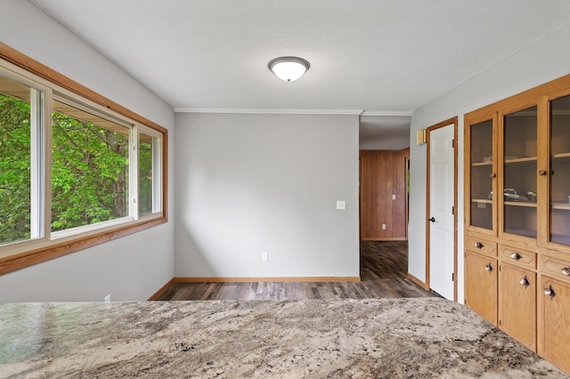 15429 Ramsey Blvd NW, Ramsey, MN 55303 - spare room with wood finished floors, baseboards, and a textured ceiling