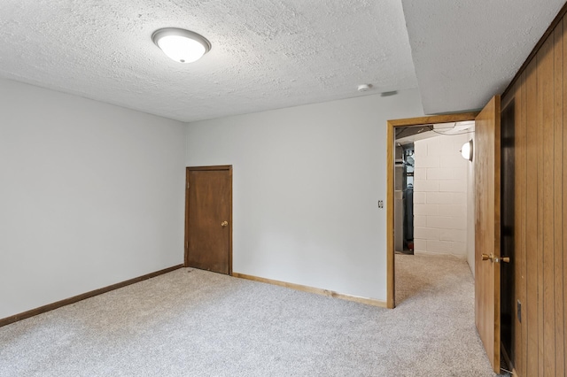 15429 Ramsey Blvd NW, Ramsey, MN 55303 - carpeted empty room featuring a textured ceiling, a smoke detector, and baseboards