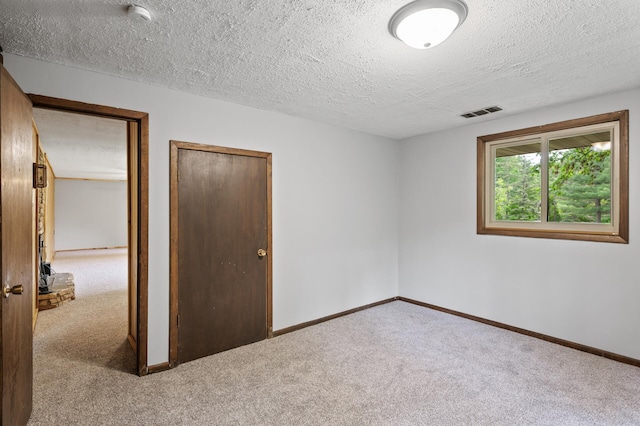 15429 Ramsey Blvd NW, Ramsey, MN 55303 - unfurnished bedroom with carpet, a textured ceiling, and baseboards