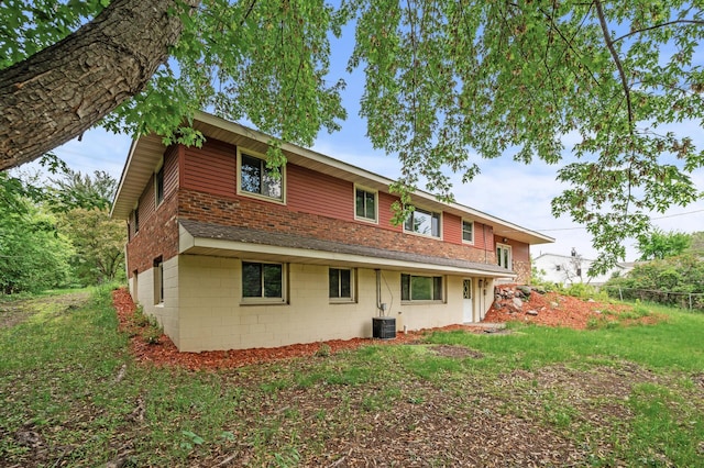 15429 Ramsey Blvd NW, Ramsey, MN 55303 - rear view of house with central AC unit