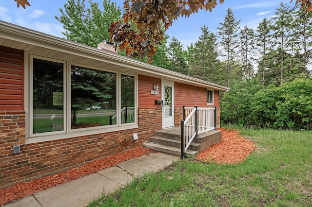 15429 Ramsey Blvd NW, Ramsey, MN 55303 - entrance to property featuring a chimney and brick siding