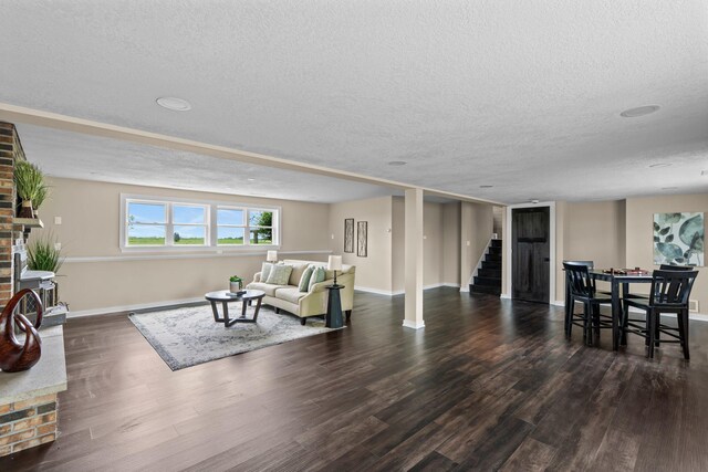 17323 County 31st Blvd, Welch Twp, MN 55089 - living area with a textured ceiling, stairway, and wood finished floors