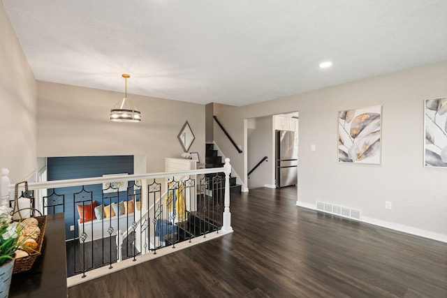 17323 County 31st Blvd, Welch Twp, MN 55089 - corridor with wood finished floors, a chandelier, and recessed lighting