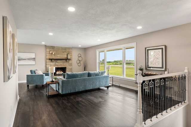 17323 County 31st Blvd, Welch Twp, MN 55089 - living area with a fireplace, a textured ceiling, recessed lighting, and dark wood finished floors