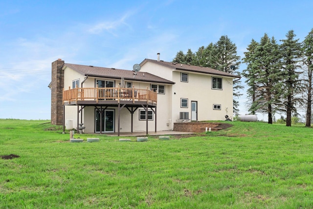 17323 County 31st Blvd, Welch Twp, MN 55089 - back of property featuring stucco siding, a deck, a lawn, and a patio