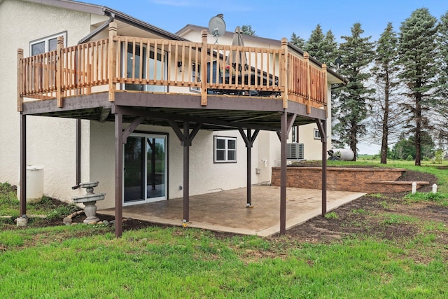 17323 County 31st Blvd, Welch Twp, MN 55089 - rear view of property featuring a patio, stucco siding, and a wooden deck