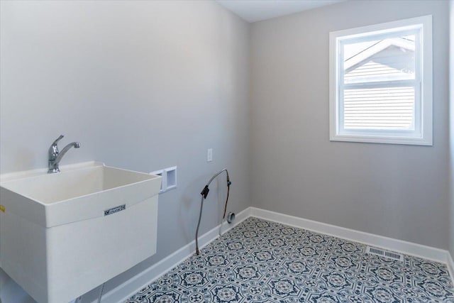 7830 Adler Trl, Inver Grove Heights, MN 55077 - laundry area with washer hookup and baseboards