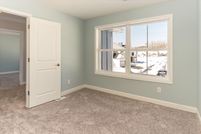 7830 Adler Trl, Inver Grove Heights, MN 55077 - carpeted spare room featuring healthy amount of natural light and baseboards
