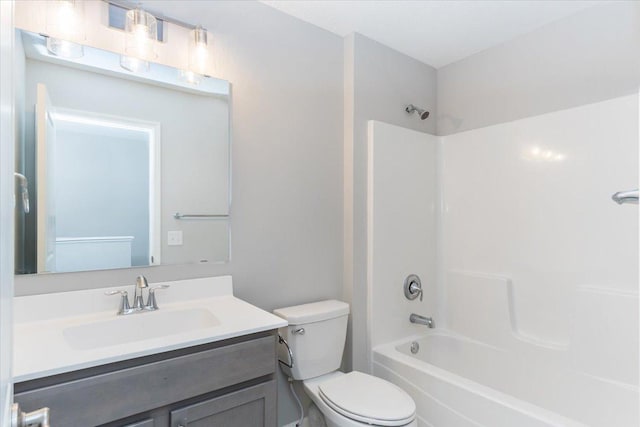 7830 Adler Trl, Inver Grove Heights, MN 55077 - bathroom featuring vanity, toilet, and washtub / shower combination