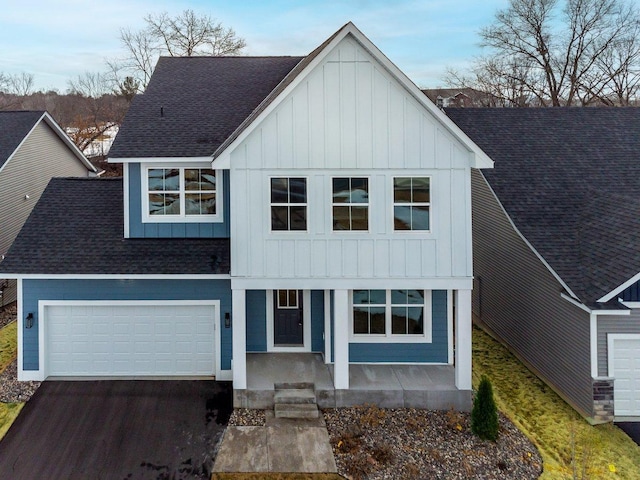 7830 Adler Trl, Inver Grove Heights, MN 55077 - modern inspired farmhouse with board and batten siding, asphalt driveway, roof with shingles, and a porch