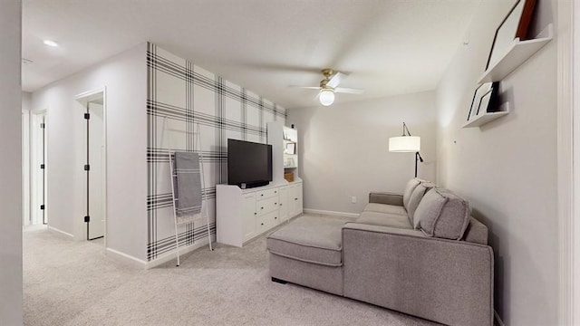 6775 Bluestem Way, Minnetrista, MN 55331 - living area featuring a ceiling fan, baseboards, and light carpet