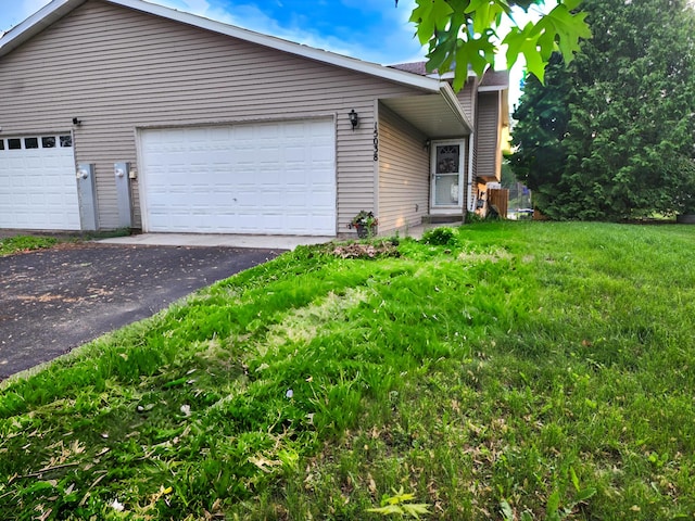 15038 Glenbrook Ave N, Hugo, MN 55038 - view of side of home with a garage and a lawn