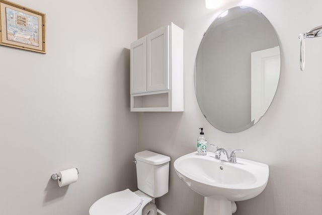 6944 Xanthus Ln N, Maple Grove, MN 55311 - half bathroom featuring toilet and a sink