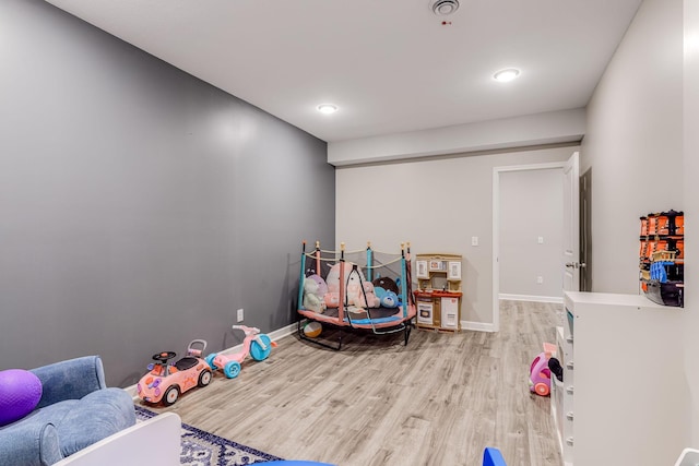 6944 Xanthus Ln N, Maple Grove, MN 55311 - playroom with wood finished floors and baseboards