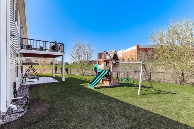6944 Xanthus Ln N, Maple Grove, MN 55311 - view of yard with a balcony, a playground, and a patio area